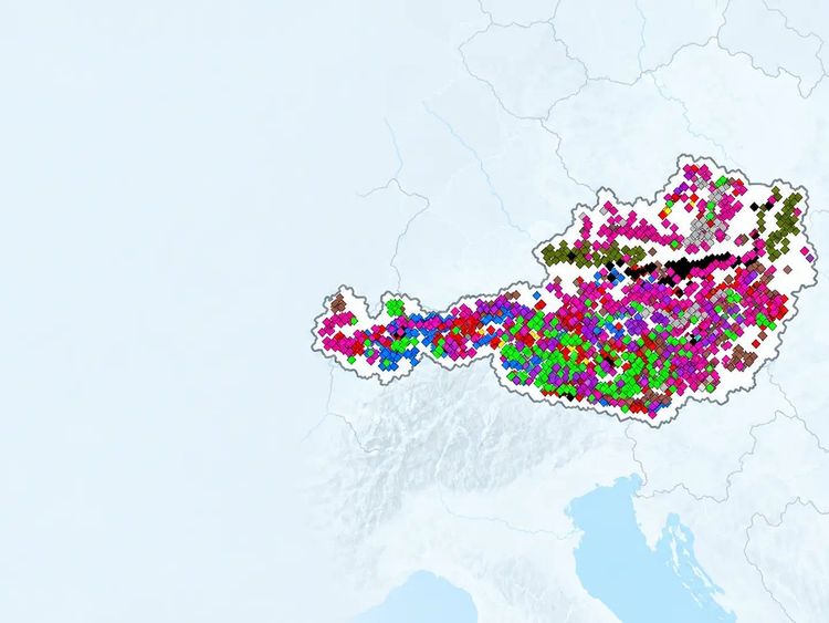 Map of Austria showing mineral resource locations marked with colored symbols.